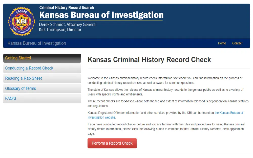 A screenshot from the Kansas bureau of investigation website's criminal history record check showing a welcome message and a red button labeled with perform a record check.