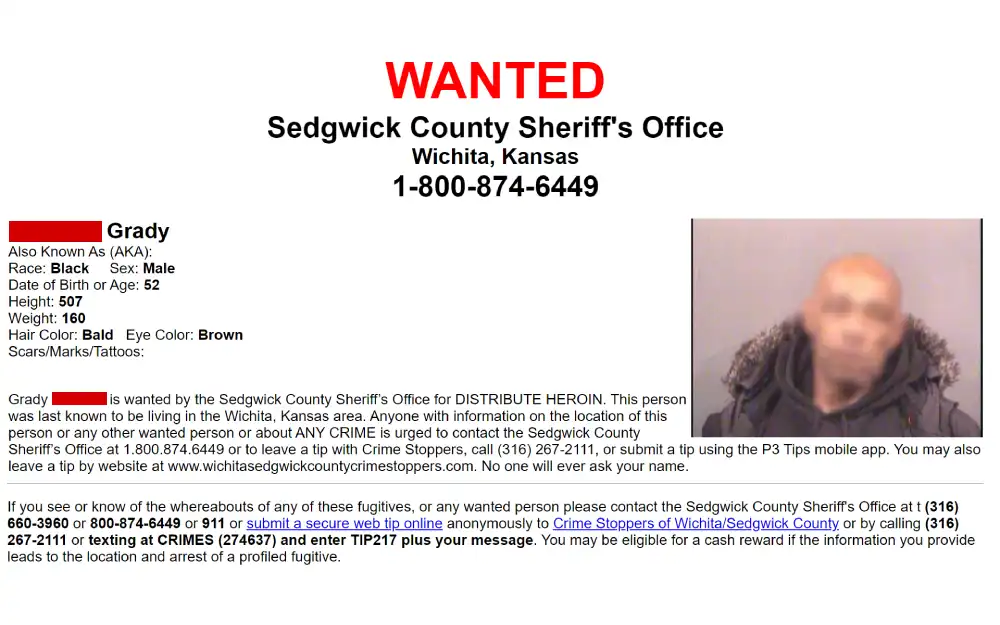 A wanted poster from the Sedgwick County Sheriff's Office providing details of an individual, including a photograph, physical description, known aliases, and contact information for reporting tips, with a clear disclaimer encouraging safe public participation in law enforcement efforts.